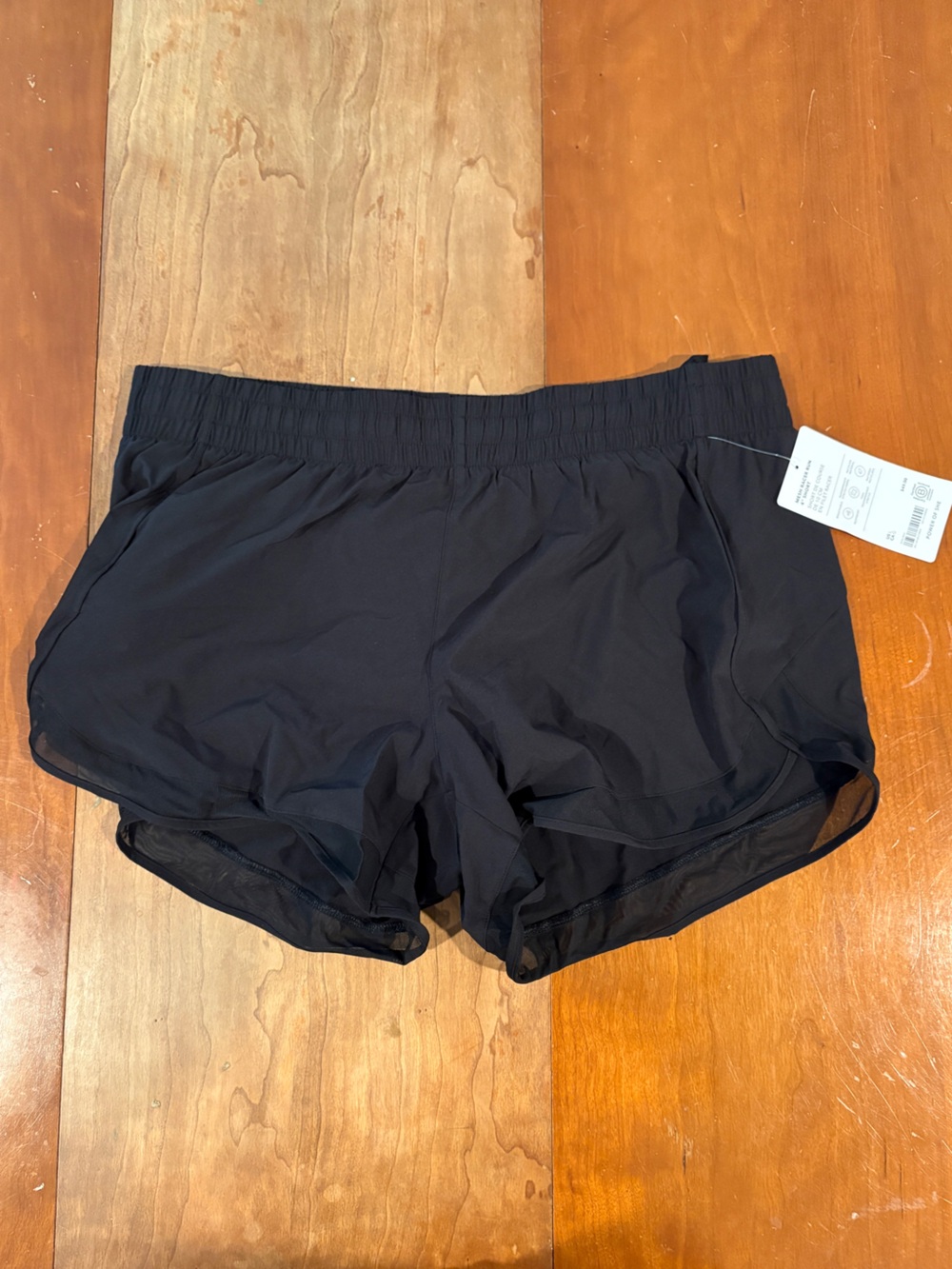 Athleta Women’s Black Mesh Racer Run 4” Shorts